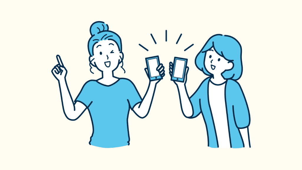 スマホを持つ二人の女性